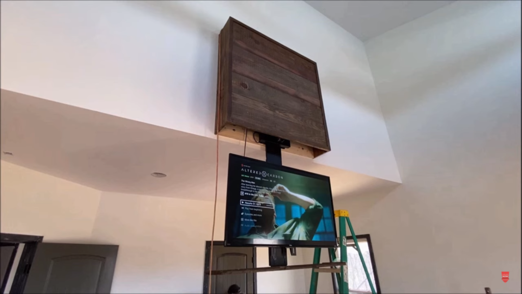 The pros of a wall mounted TV lift mechanism and cabinet